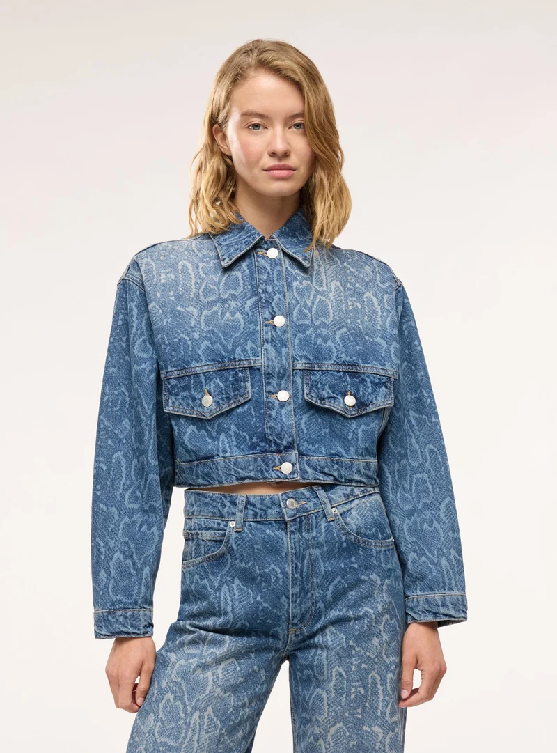 Jeans straight con stampa pitone