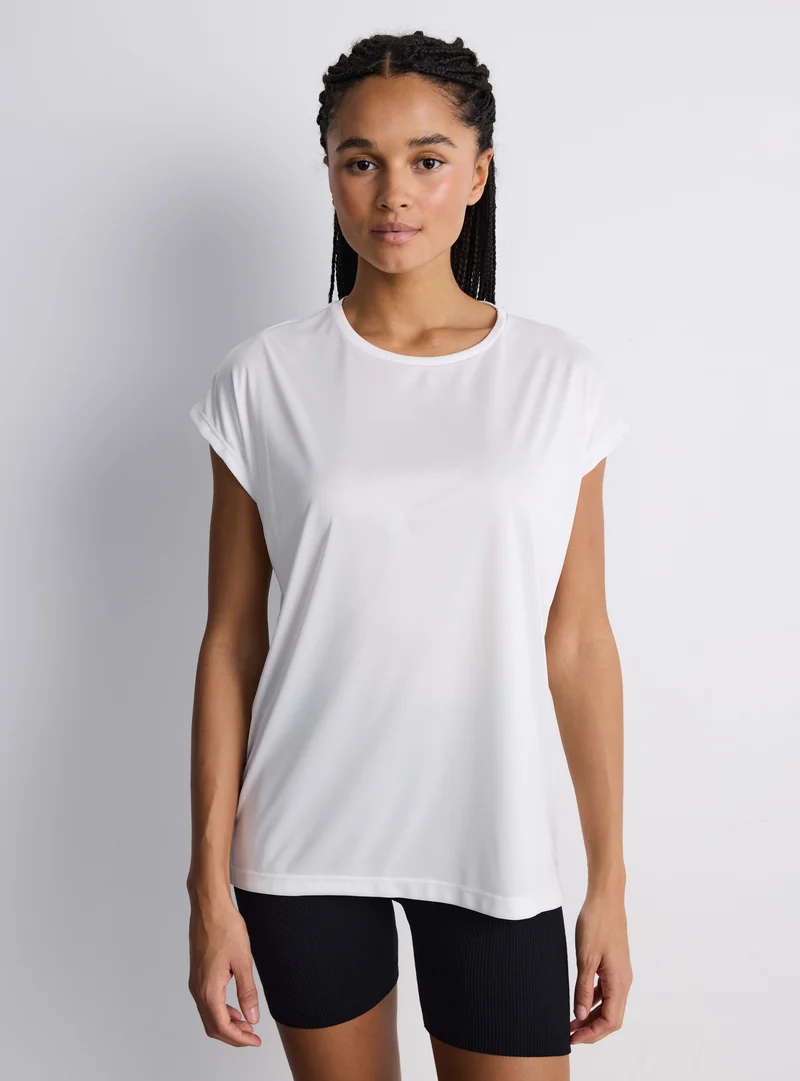 T-shirt sportiva ampia tinta unita
