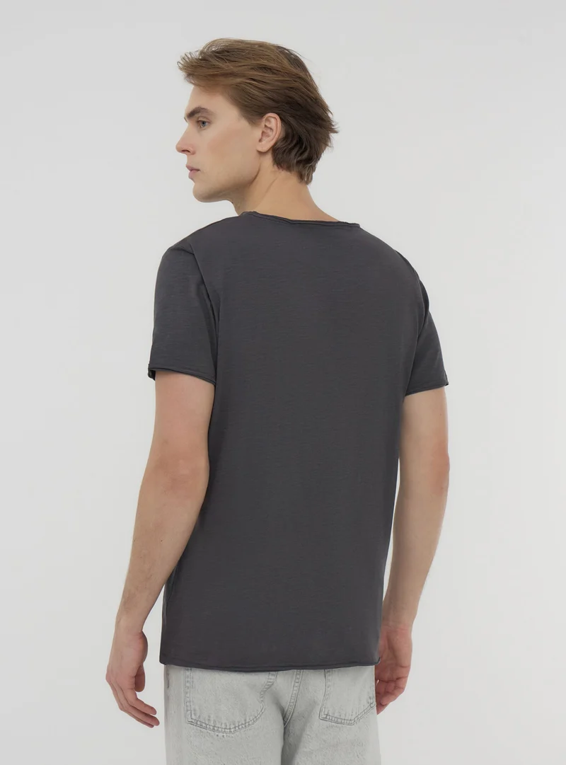 T-shirt taglio vivo tessuto fiammato