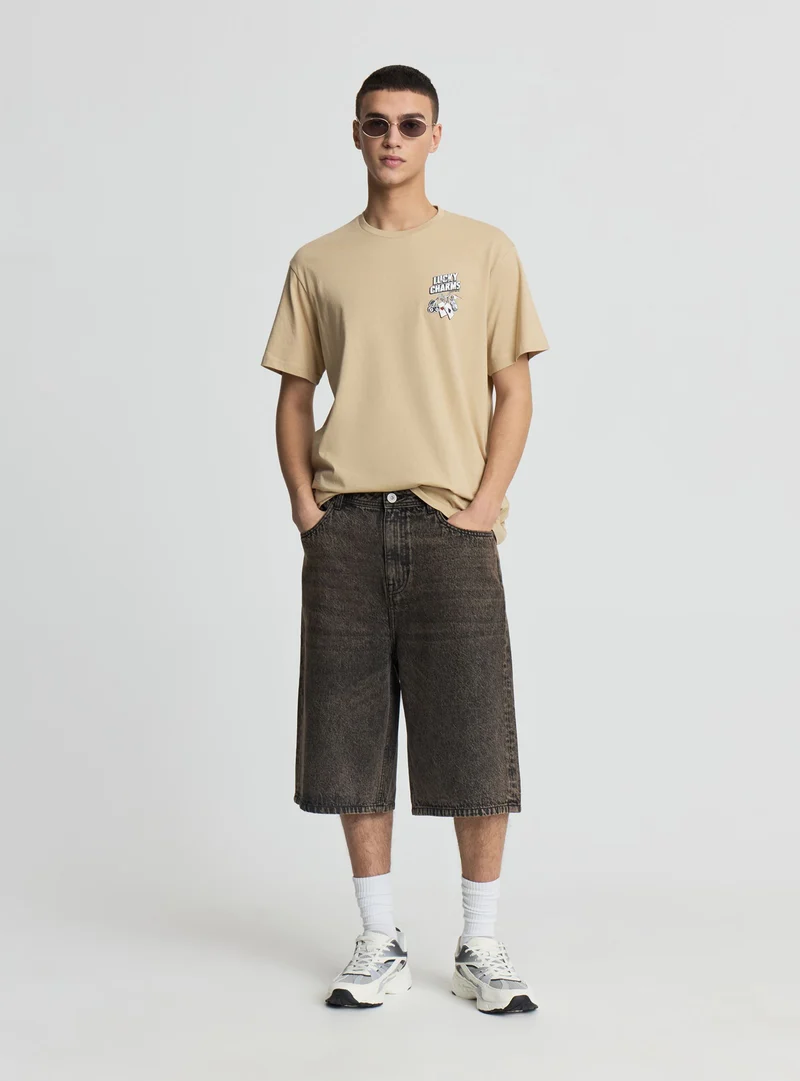 T-shirt con stampa dadi e carte fronte/retro