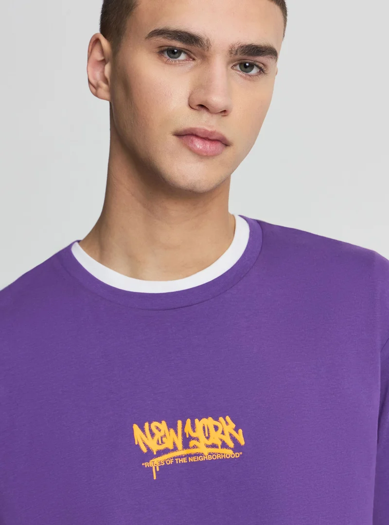 T-shirt con stampa grafica fronte e retro