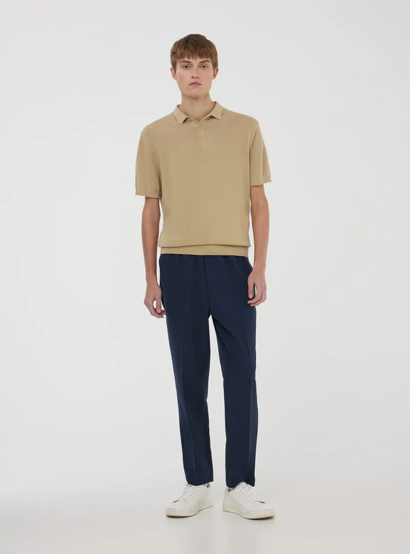 Polo in maglia tinta unita