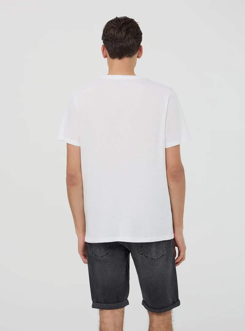 T-shirt con scritta frontale