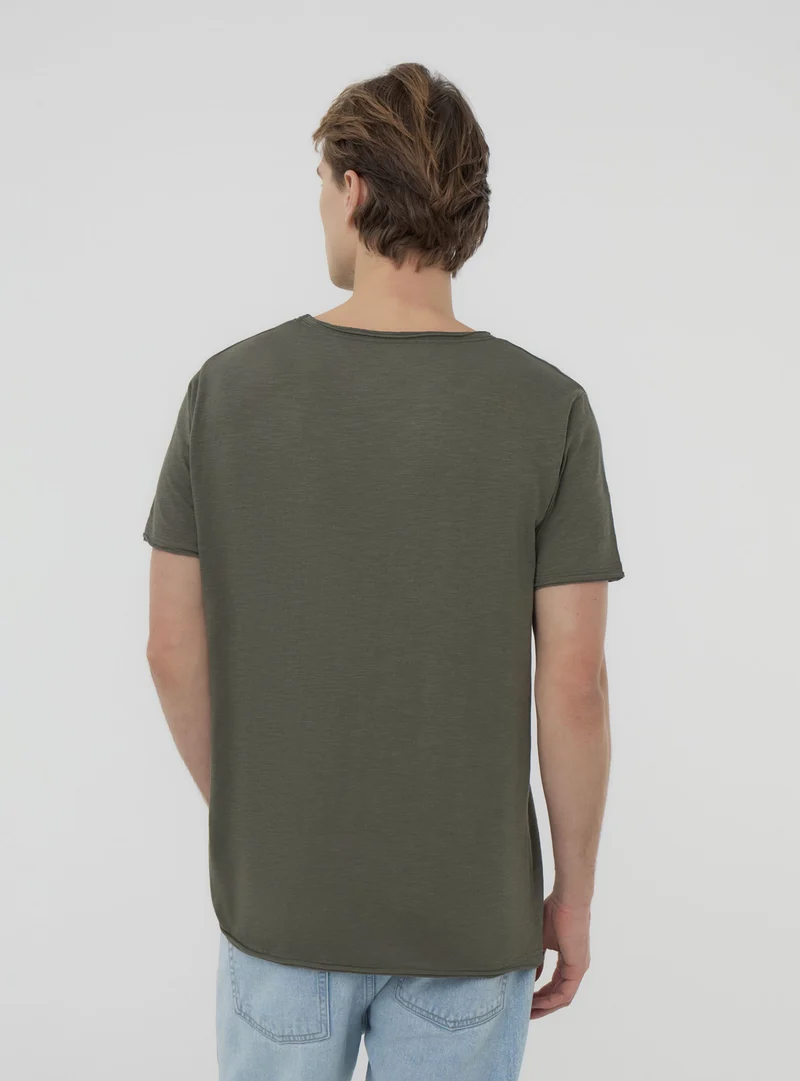 T-shirt taglio vivo tessuto fiammato