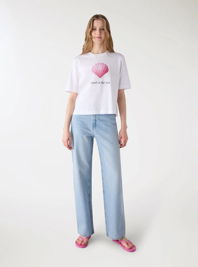 T-shirt con stampa marina e strass