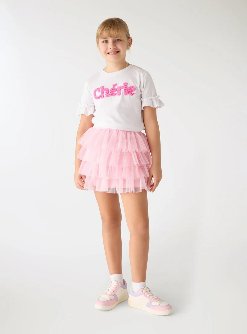 T-shirt con scritta e maniche a balze