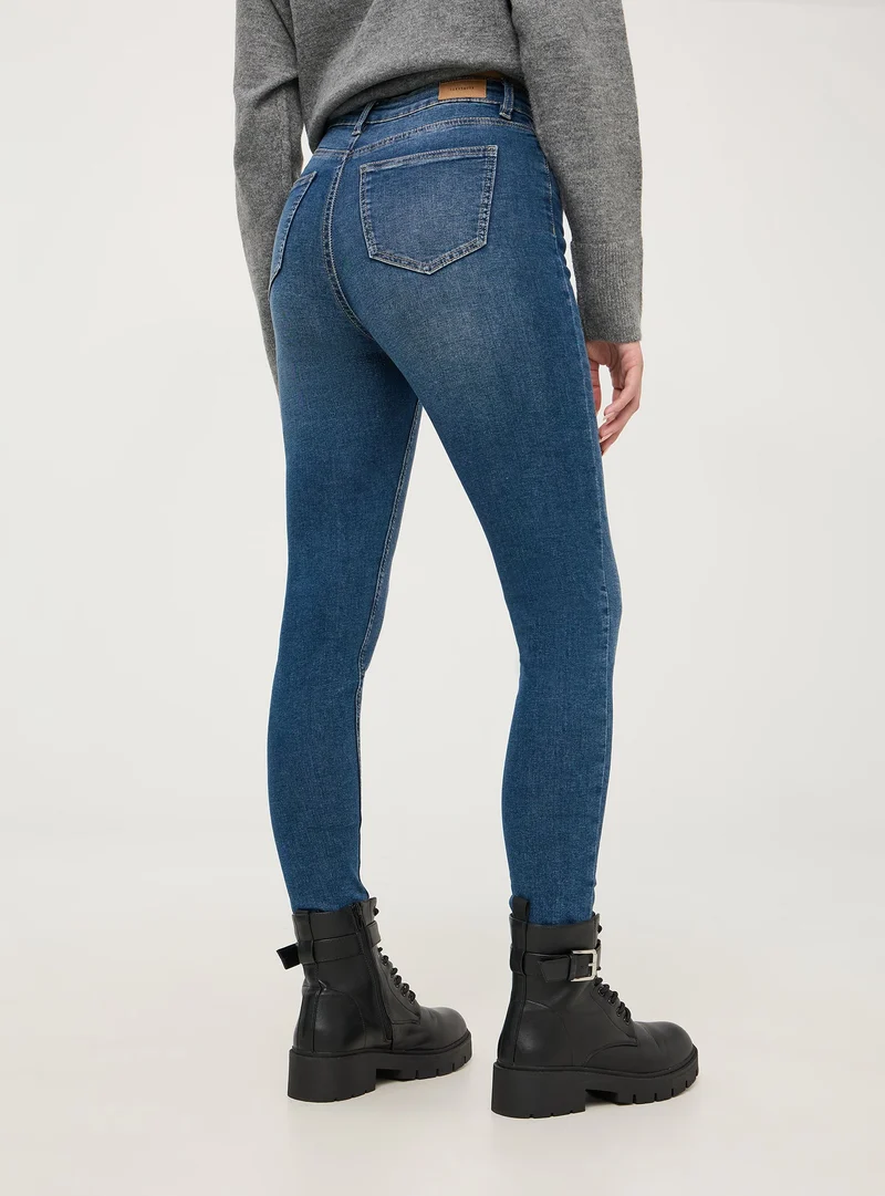 Jeans skinny a vita alta