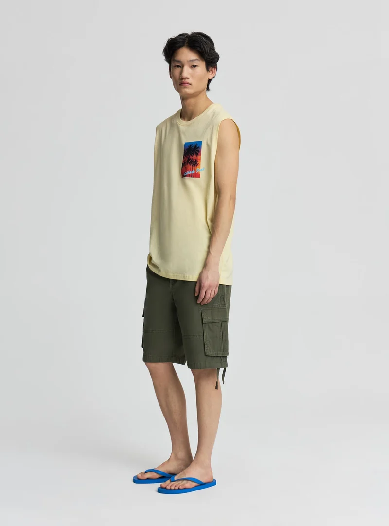 T-shirt smanicata con stampa palme fronte e retro