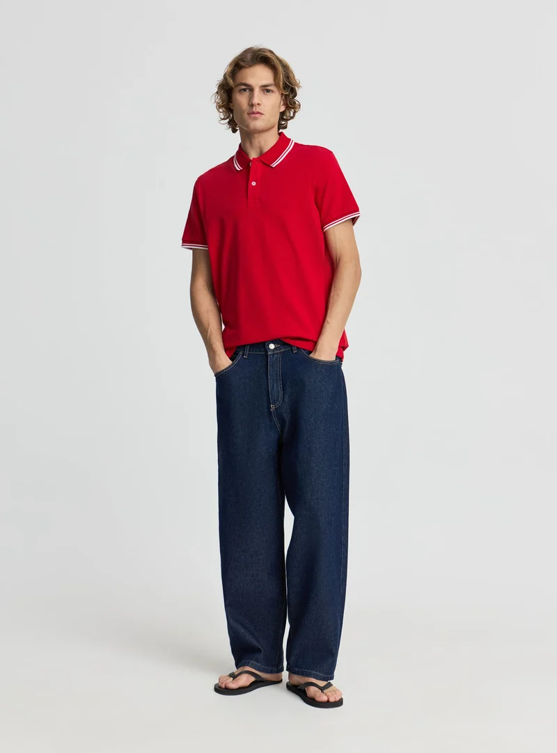 T-shirt polo con profili a contrasto