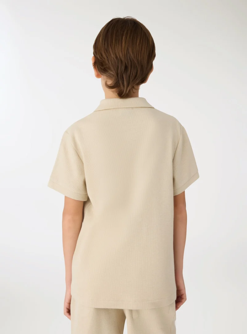 T-shirt polo a tinta unita