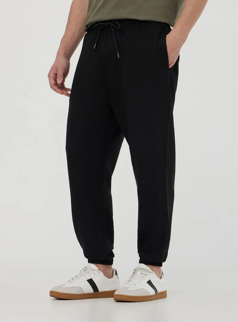 Pantaloni jogger con coulisse