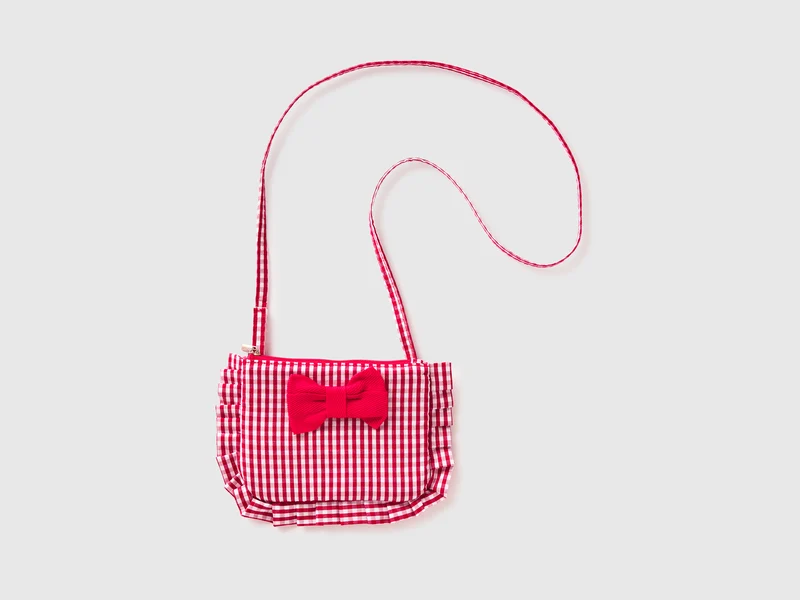 Borsa con rouches e fiocco