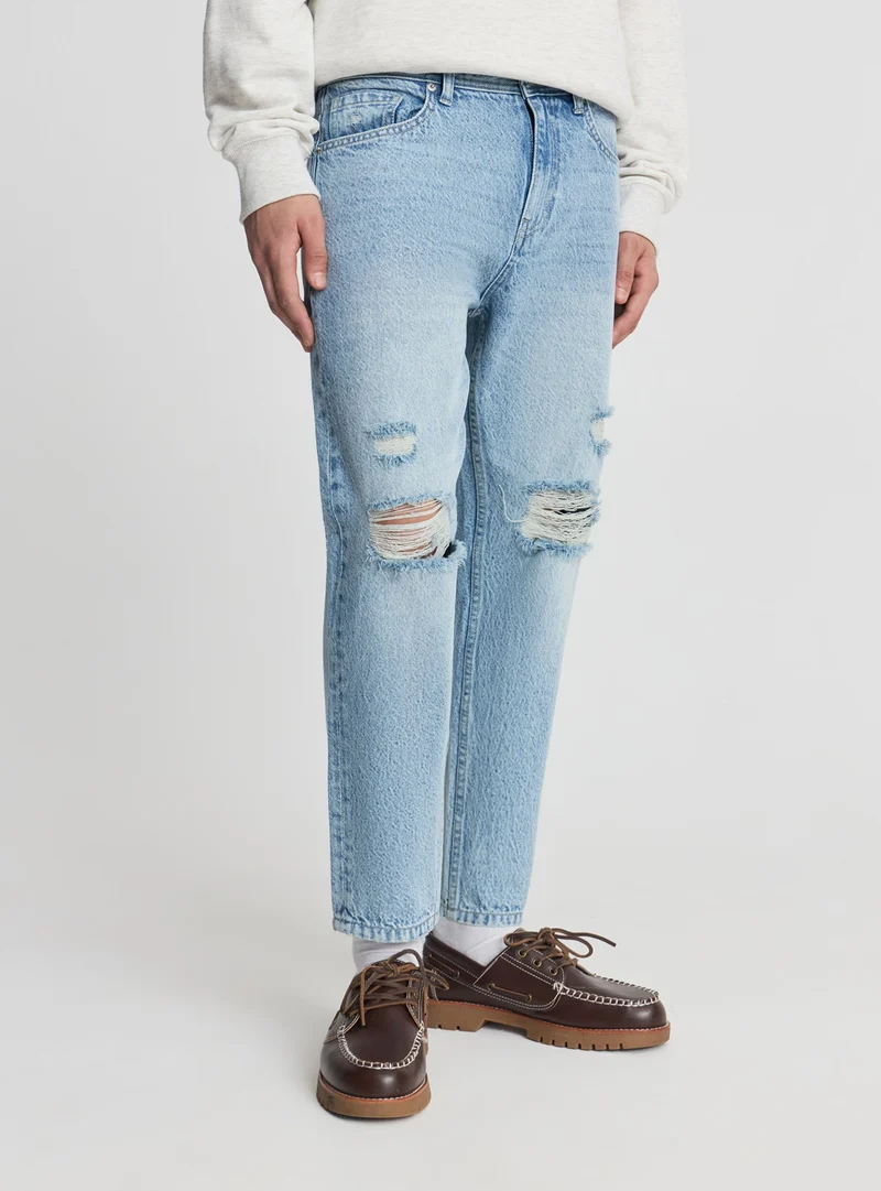 Jeans loose con strappi