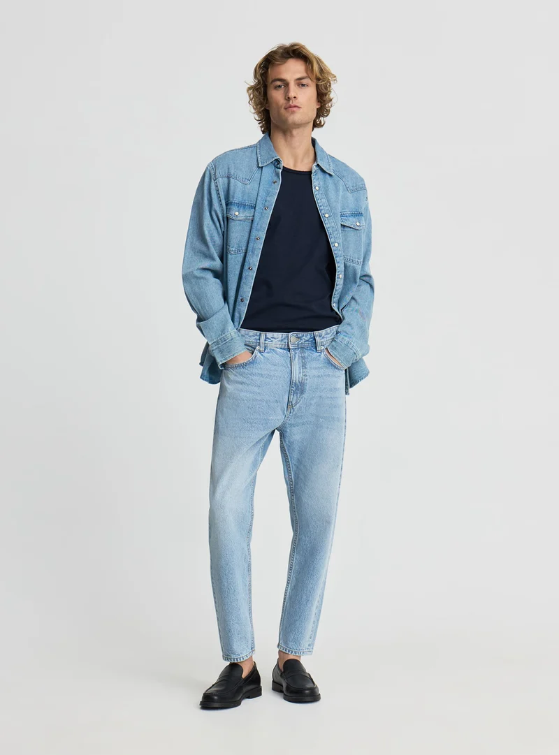 Jeans relaxed a tinta unita