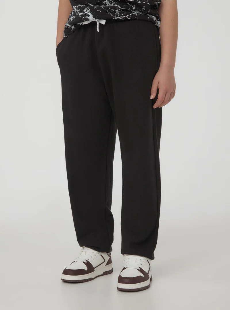 Pantaloni tuta con coulisse e tasche