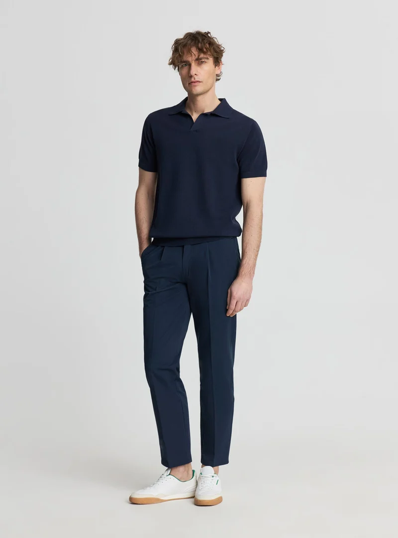 T-shirt polo in maglia tinta unita