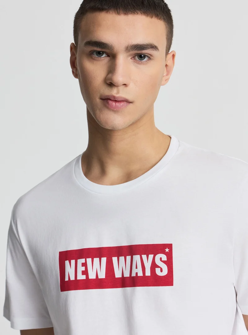 T-shirt con scritta