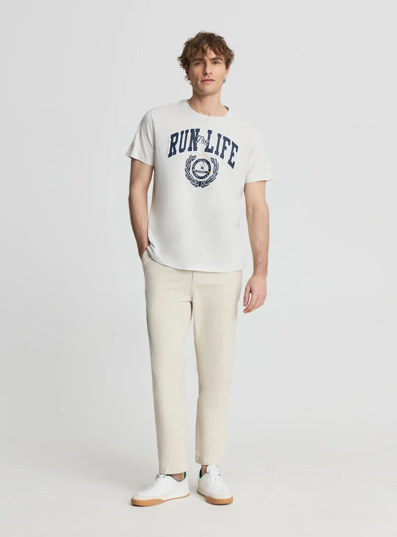 T-shirt con stampa college