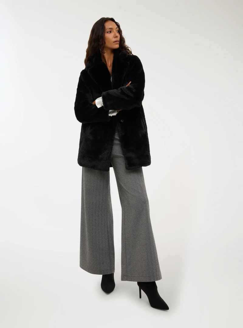 Cappotto in similpelliccia collo con revers