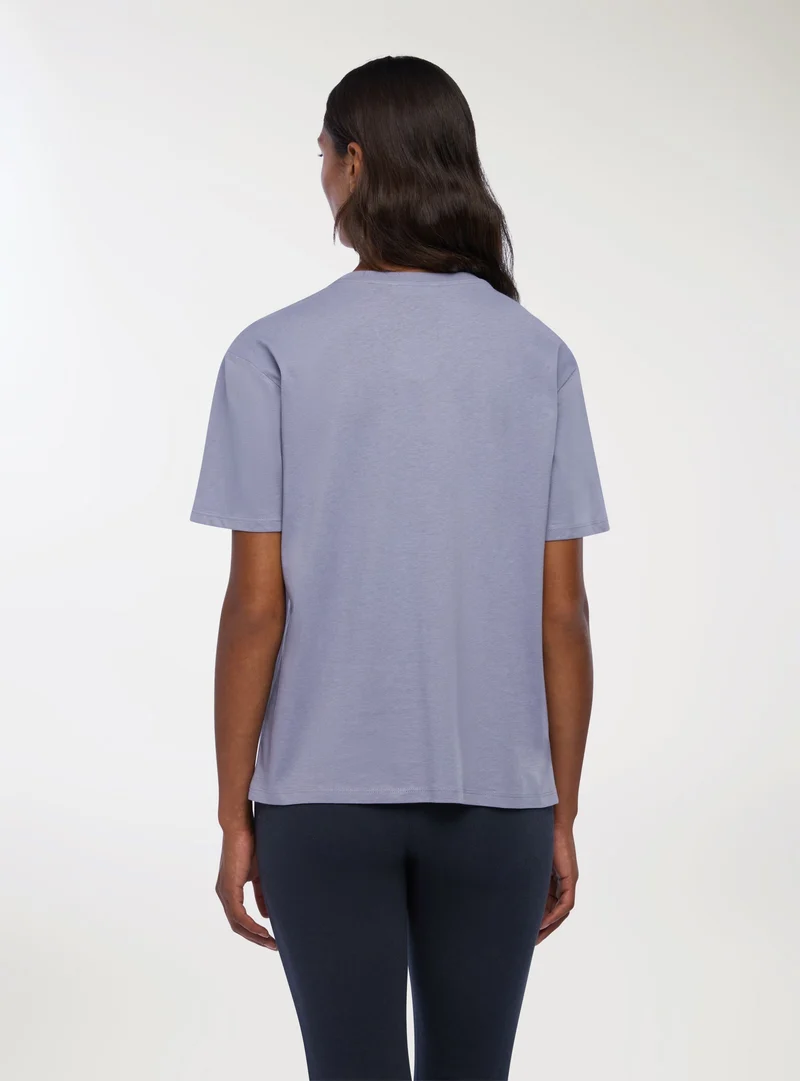 T-shirt ampia con scritta