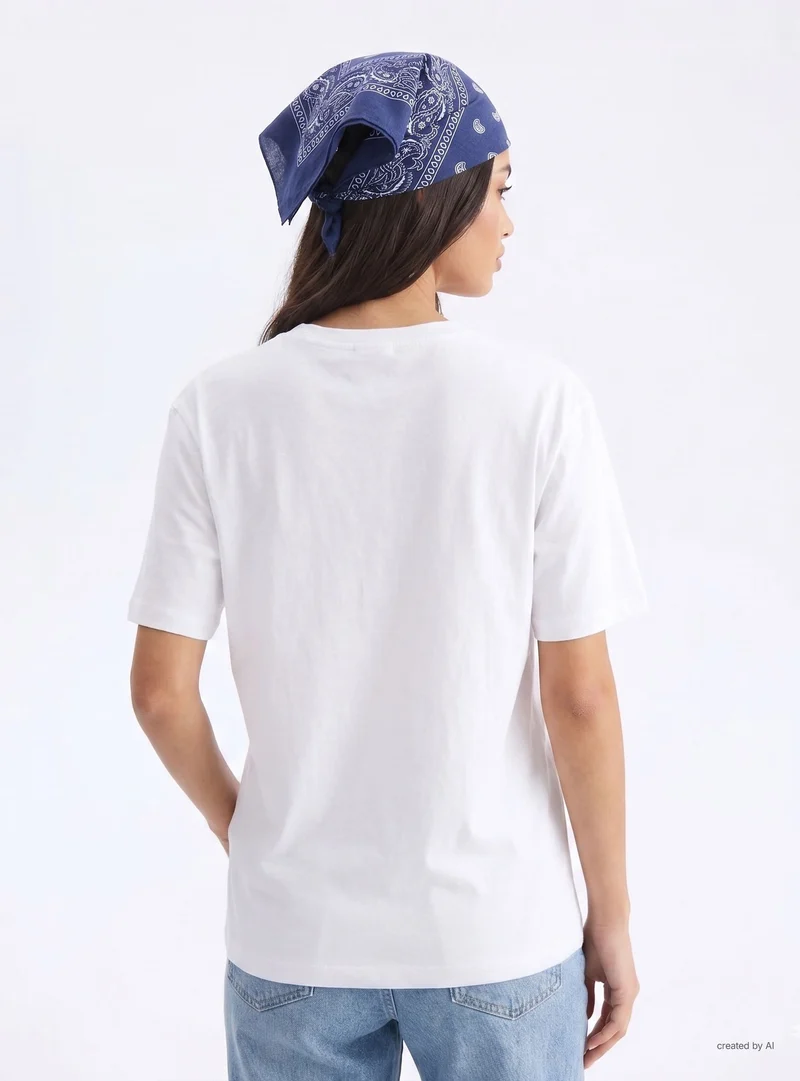 T-shirt ampia con scritta