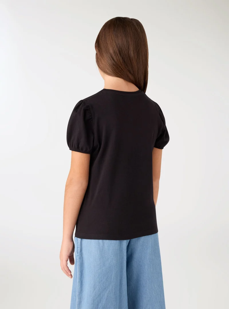 T-shirt con strass e maniche a palloncino