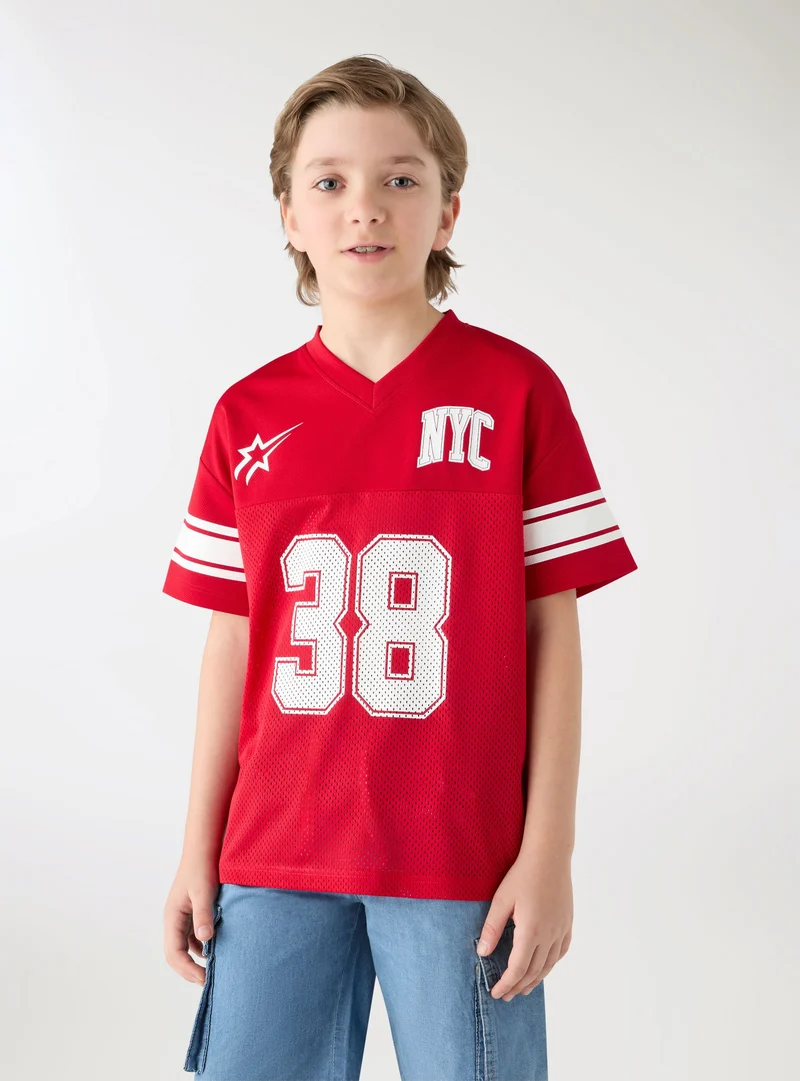 T-shirt sportiva con stampa numero e scritta