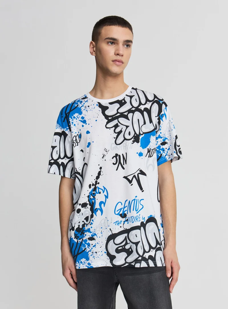 T-shirt relaxed con stampa graffiti allover