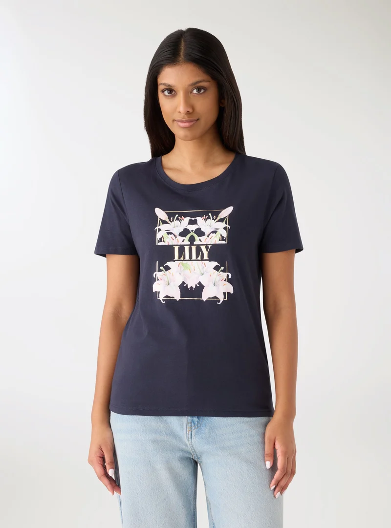 T-shirt con stampa fiori e scritta