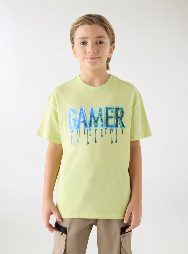 T-shirt con scritta gamer