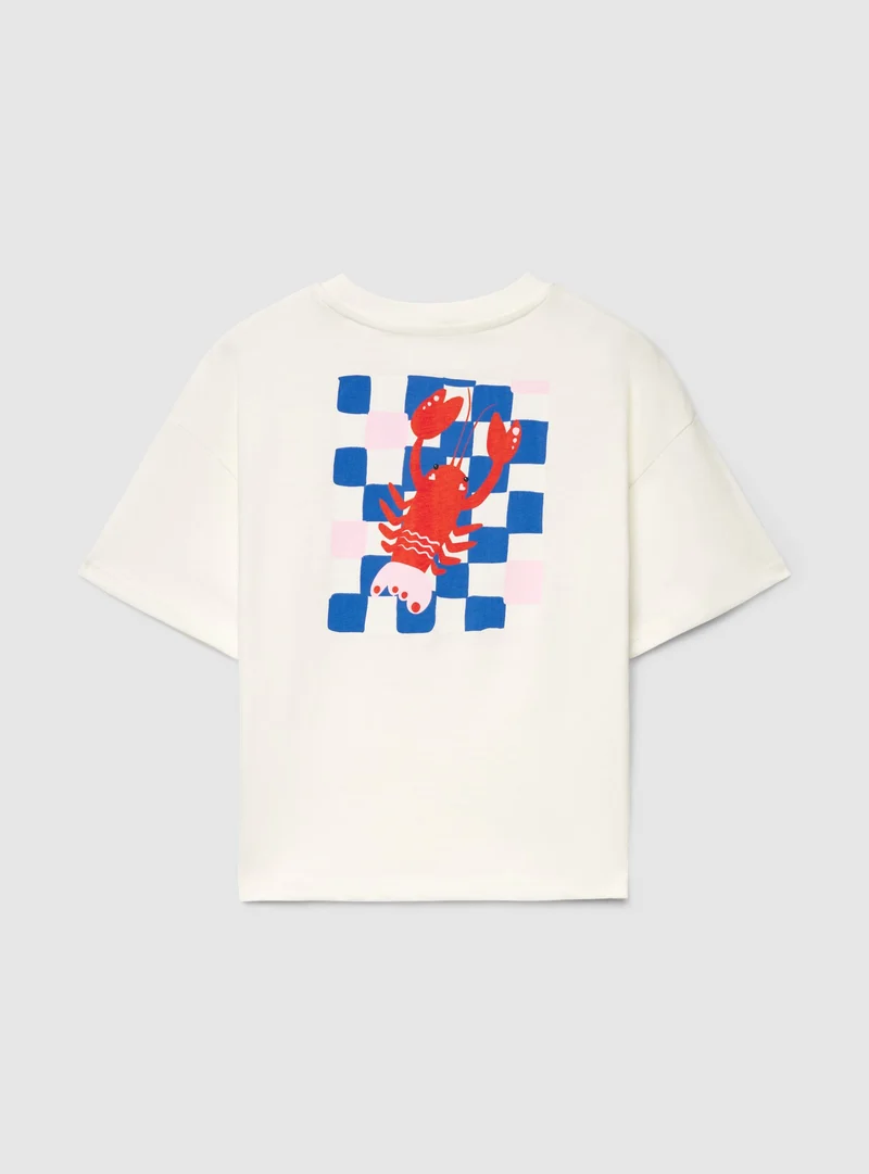 T-shirt crop con scritta e stampa grafica