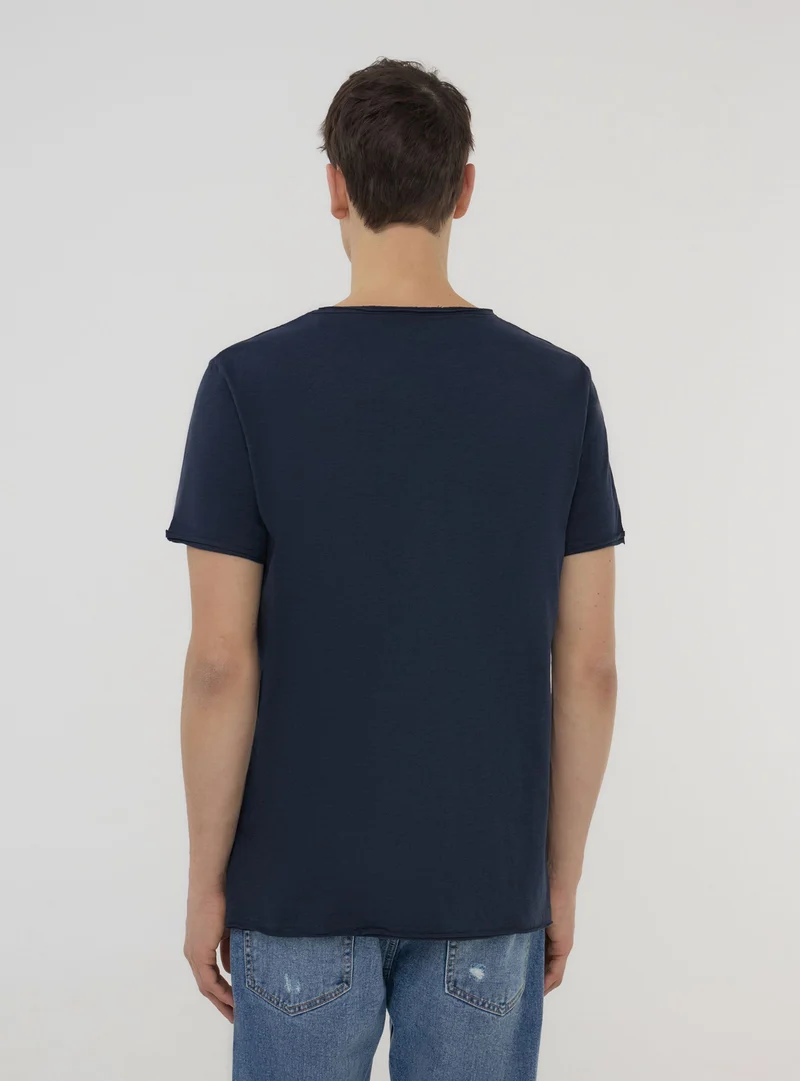 T-shirt taglio vivo tessuto fiammato