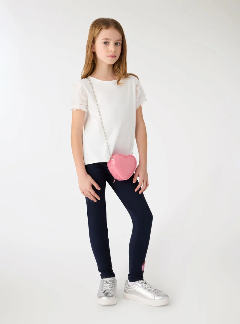 T-shirt con maniche in tulle a petali