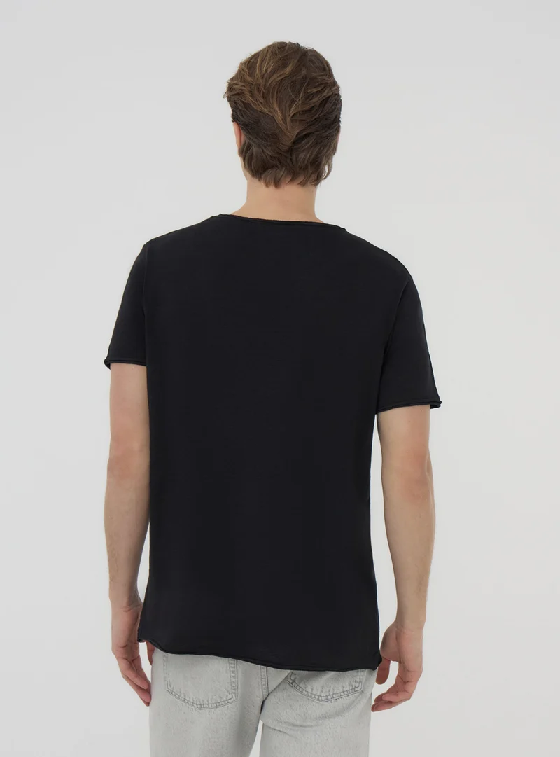T-shirt taglio vivo tessuto fiammato