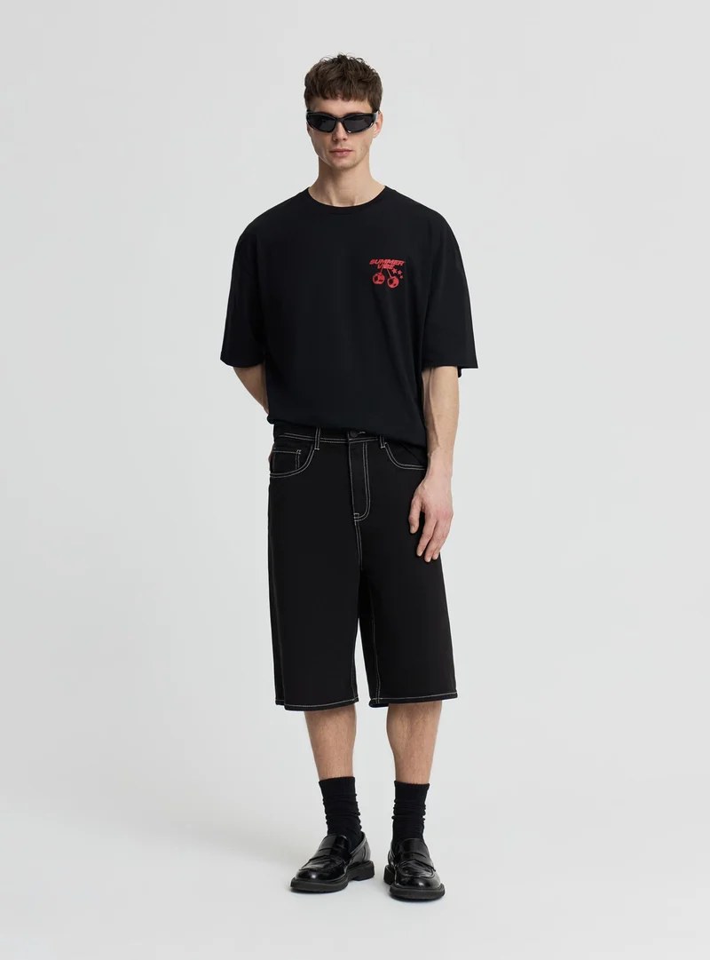 T-shirt over con stampa ciliegie