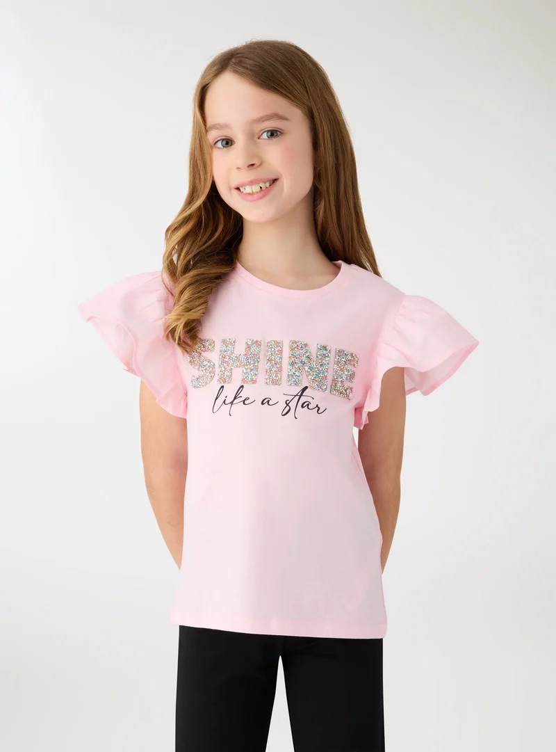 T-shirt maniche a balze e scritta glitter
