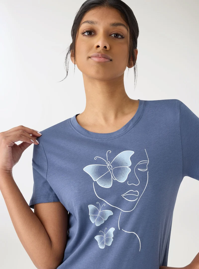 T-shirt con stampa volto