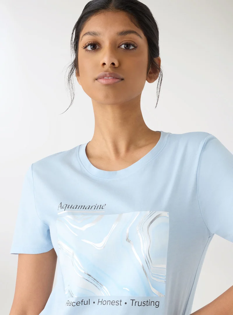 T-shirt con stampa effetto laminata