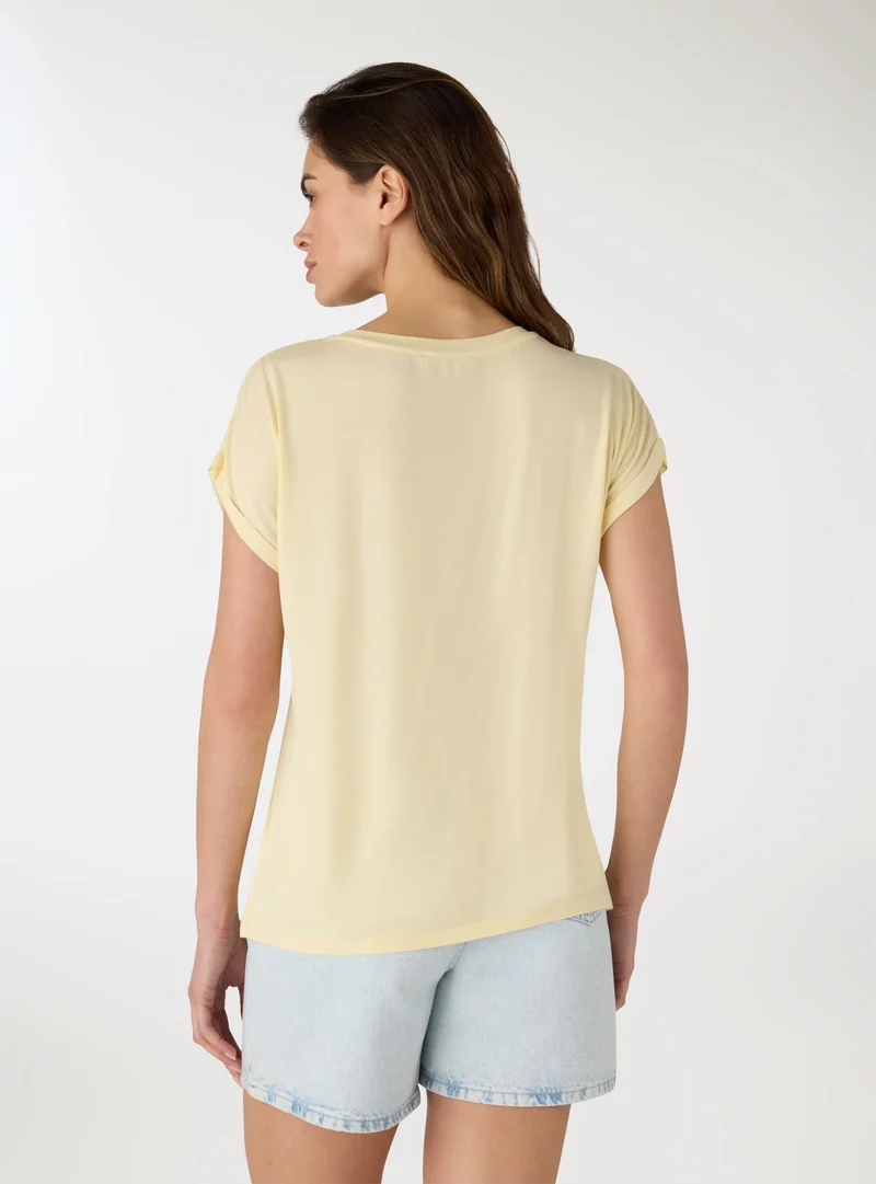 T-shirt ampia a tinta unita