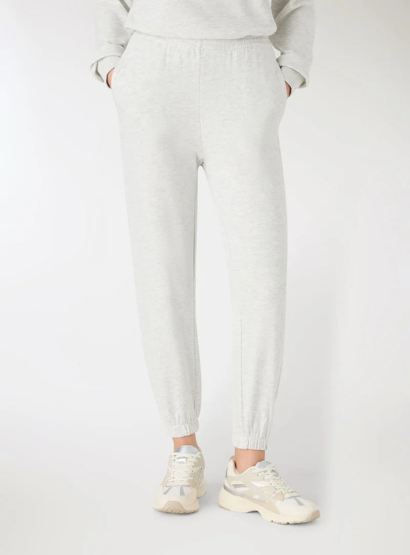 Pantaloni tuta vita alta tinta unita