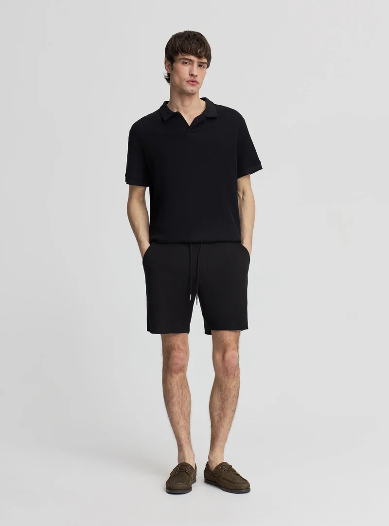 Pantaloncini bermuda con coulisse