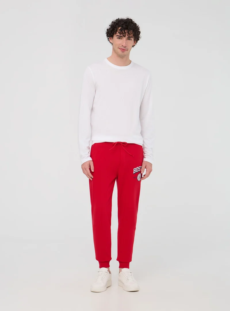 Pantaloni tuta con coulisse e stampa