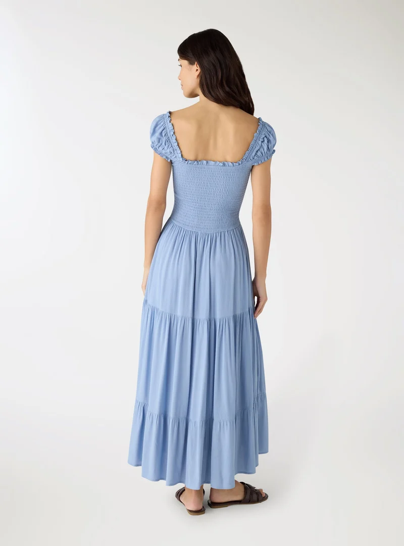 Vestito lungo a balze con spalline arricciate