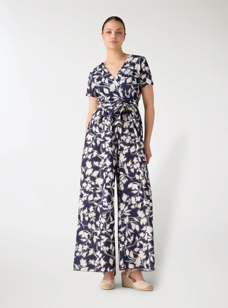 Tuta a fantasia floreale con pantalone wide leg e cintura in vita