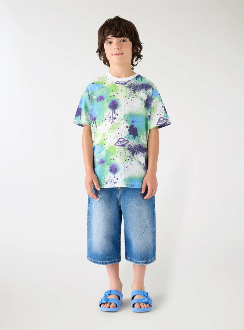 T-shirt con stampa allover graffiti