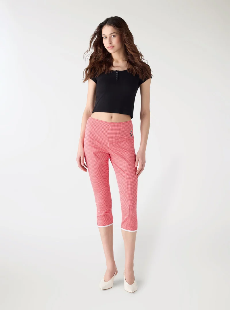 Pantaloni pinocchietto a motivo vichy TRNPOPLAB