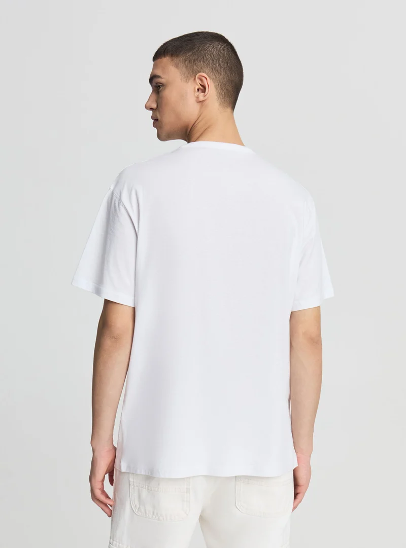 T-shirt relaxed con stampa 86