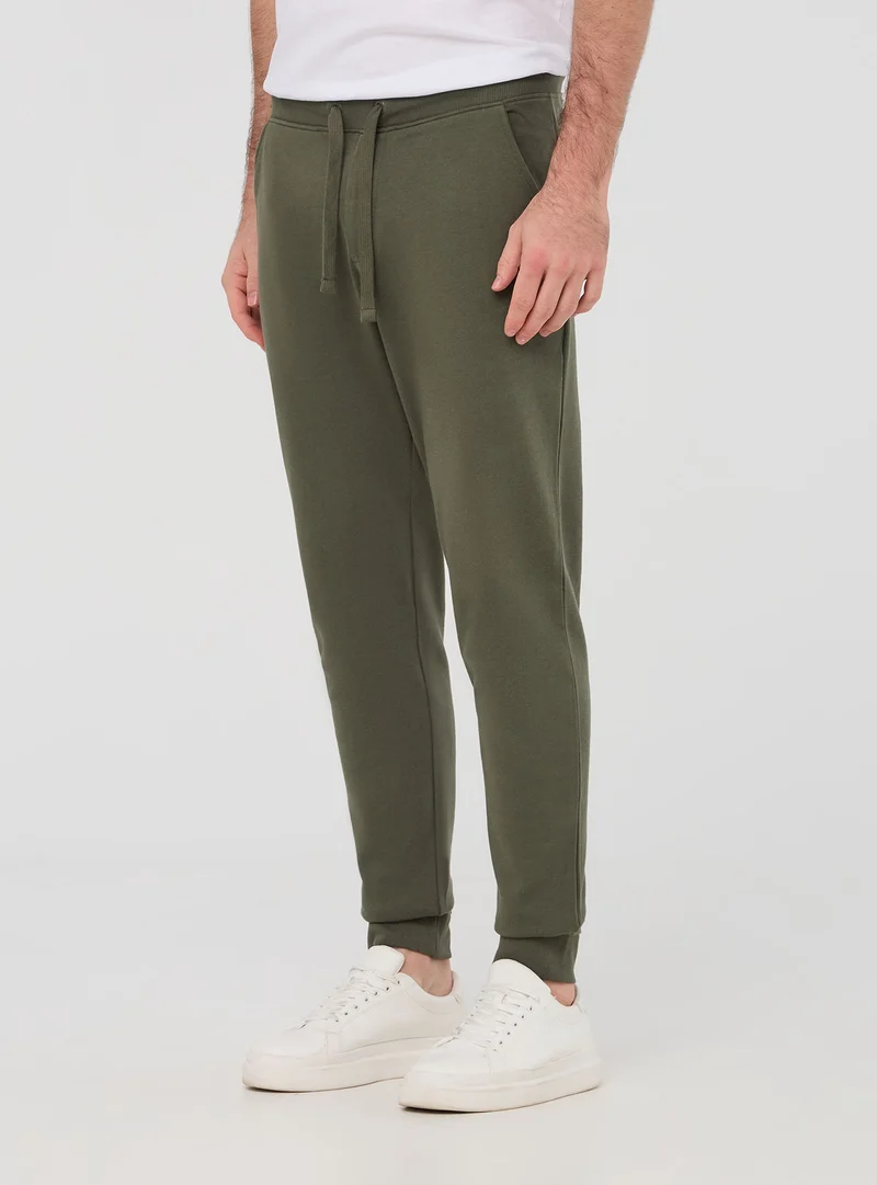 Pantaloni tuta leggeri con coulisse e tasche
