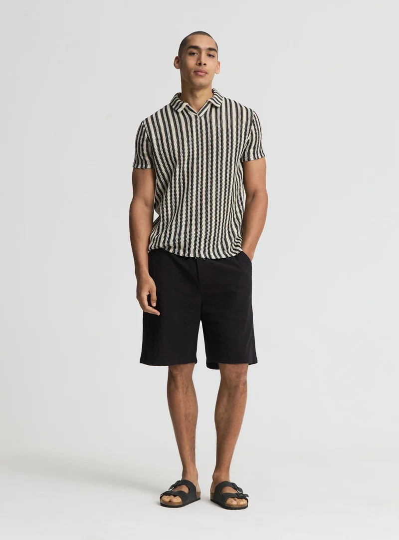 Pantaloncini tinta unita con coulisse