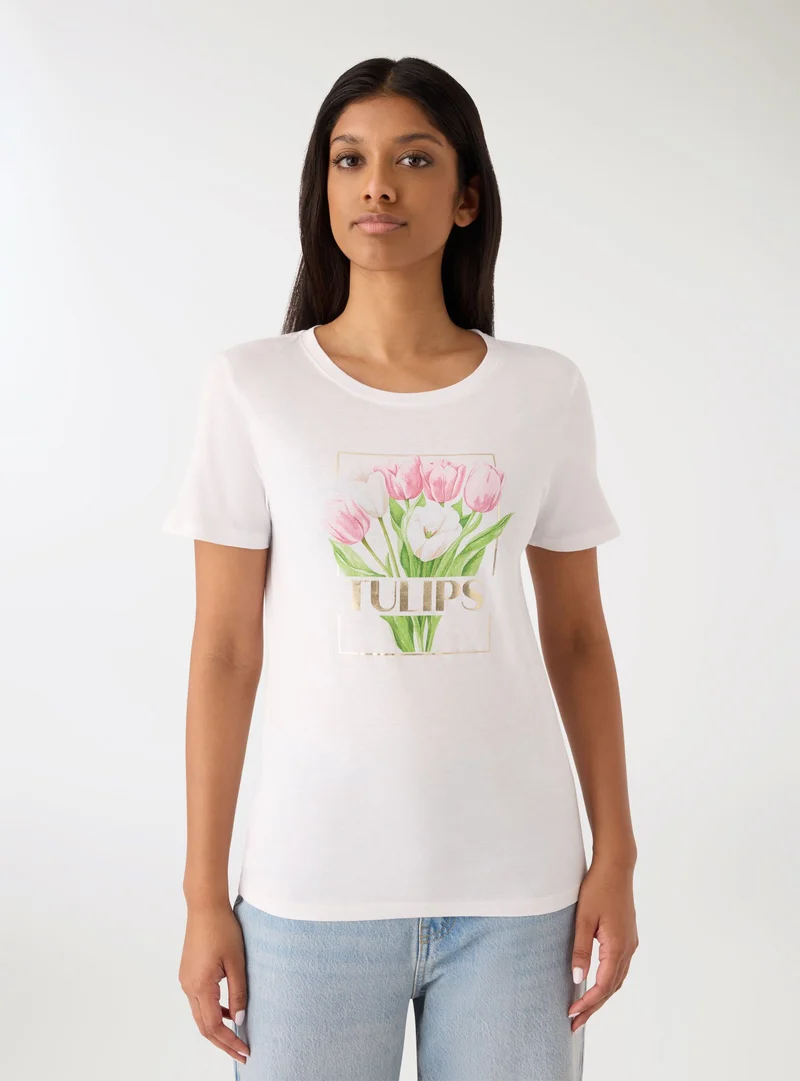 T-shirt con stampa fiori e scritta